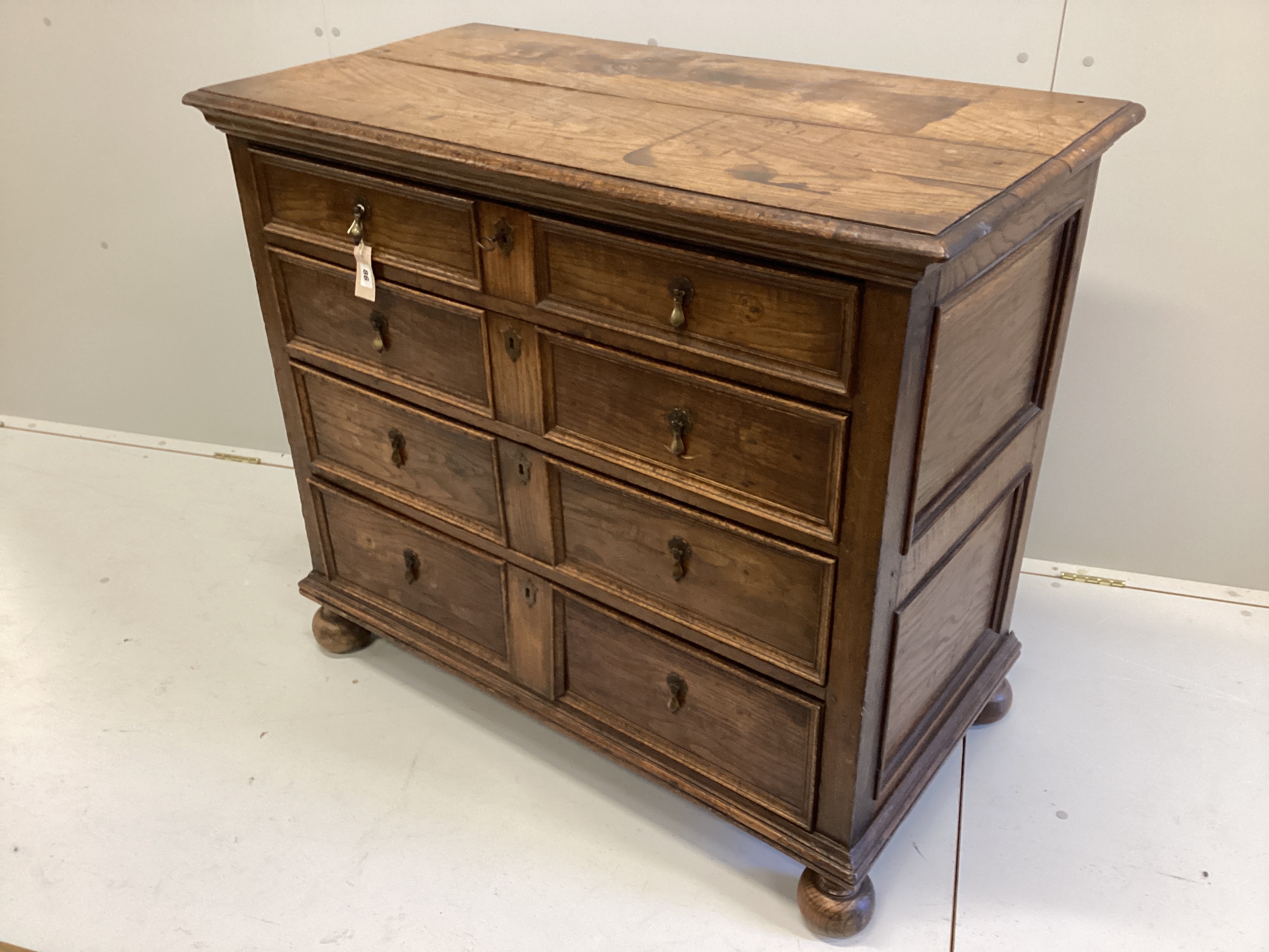 An 18th century oak four drawer chest, width 107cm, depth 56cm, height 90cm